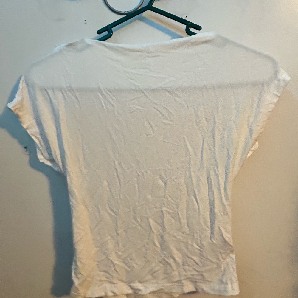 Right white shirt with open back, see through